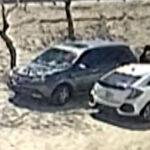 An unidentified man is seen exiting a vehicle connected to the crime. (Screenshot via PCSD)
