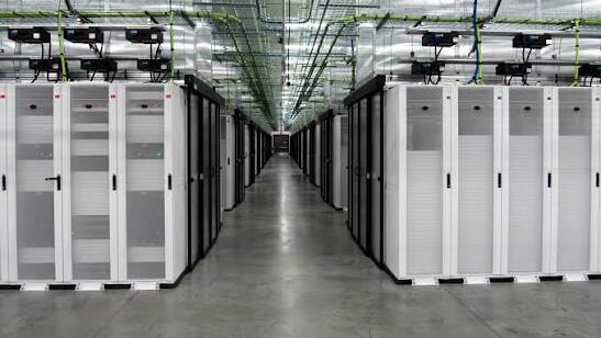 FILE Rows of servers fill a data center. Arizona Attorney General Kris Mayes is calling for a statewide pause on new data center approvals, citing concerns about the industry's water and power demands. (Photo via FBI)