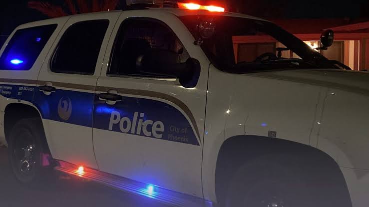 Four people were injured in a single-vehicle rollover crash in north Phoenix early Saturday morning, authorities said. (Phoenix PD)