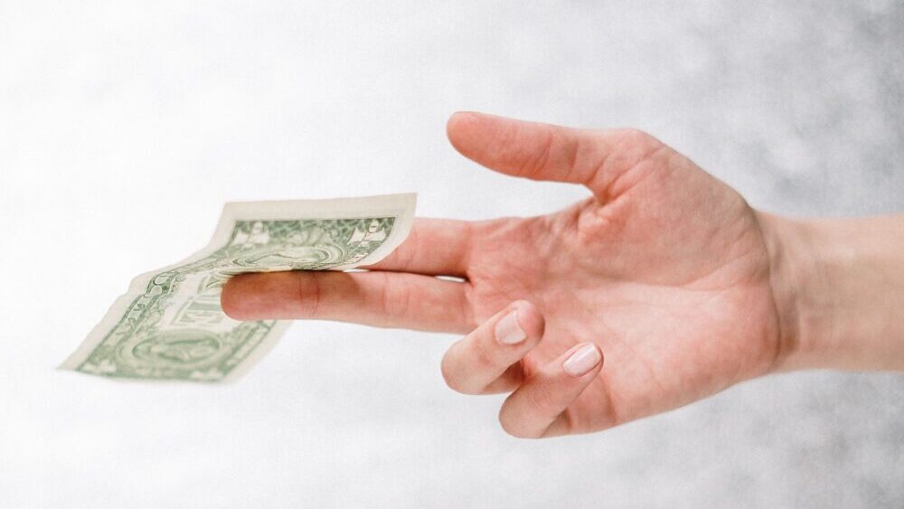 A listener of The Dave Ramsey Show asks whether or not she should giver her financially irresponsib...