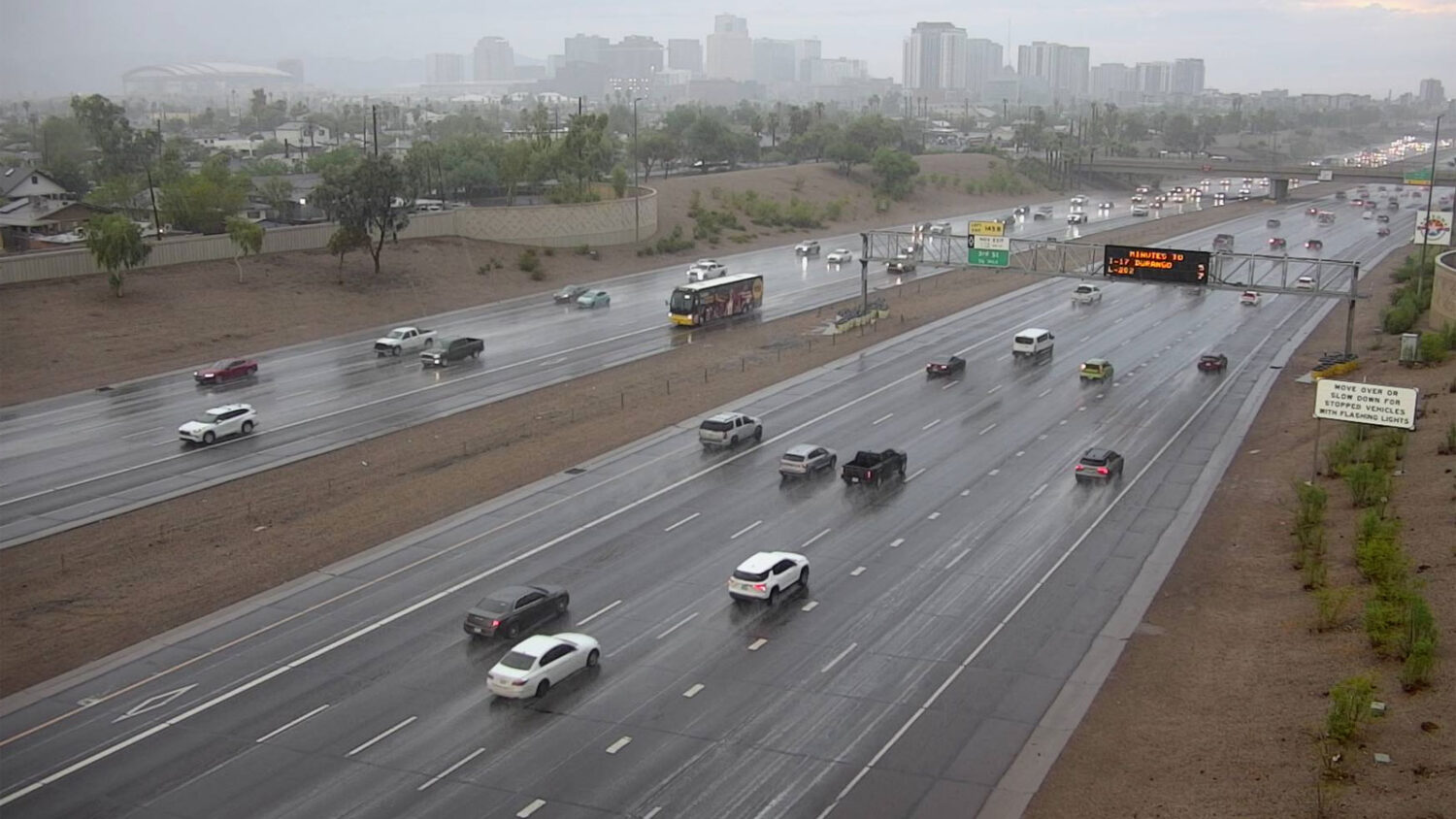 Rain fell during Monday's morning commute on Interstate 10 near downtown Phoenix. (ADOT photo)...