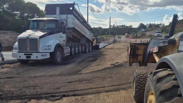 Crews lay asphalt on a road in Globe as the city continues repairs one year after deadly flooding damaged roads and downtown businesses in September 2025. Mayor Al Gameros said the third phase of mitigation work will reopen roads damaged by the flooding. (Photo courtesy of City of Globe)