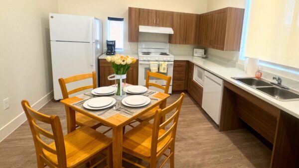A kitchen inside one of Avondale's new Family Bridge Homes. The six two-bedroom homes provide temporary housing for homeless families working toward permanent housing. (Photo via the City of Avondale)