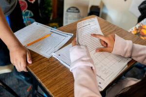 Families’ interest in their kids’ education is falling around the globe as scores drop, test shows