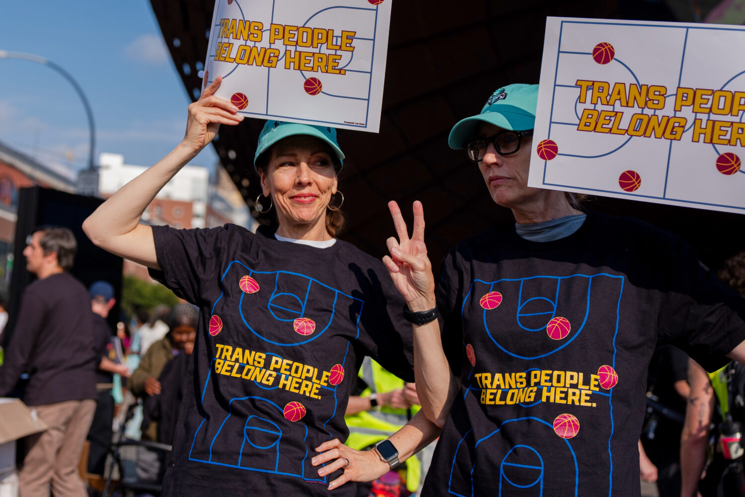 FILE - Demonstrators rally in support of transgender athletes in women's sports outside of Barclay'...