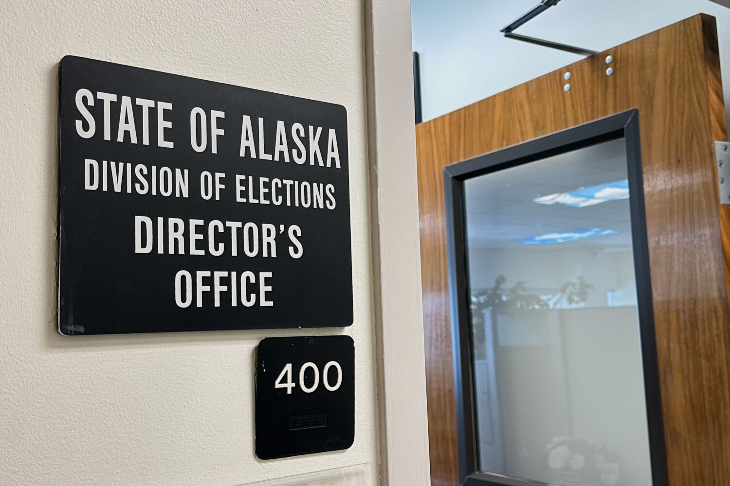 FILE - A sign indicates the director's office of the Alaska Division of Elections, March 19, 2026, ...