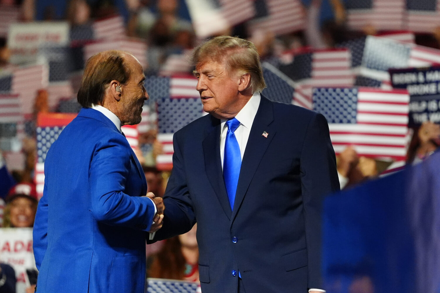 President Donald Trump greets Lee Greenwood at the Republican convention, Wednesday, Sept. 9, 2026,...
