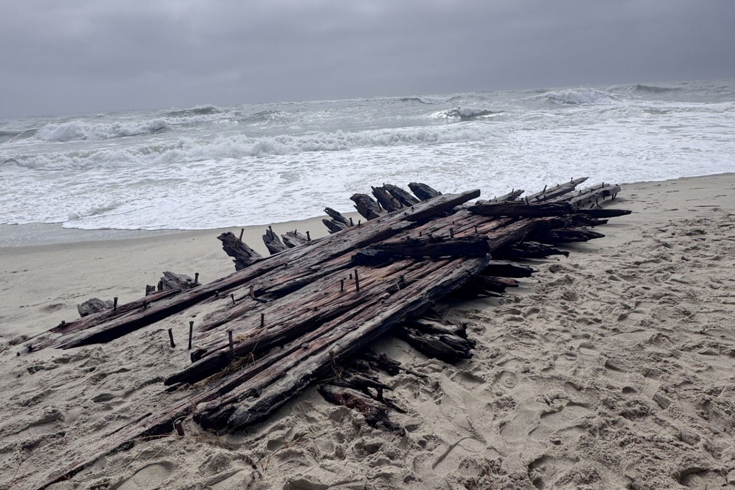 Shipwreck remains exposed by a powerful nor'easter are seen along the southern shore of Nantucket, ...