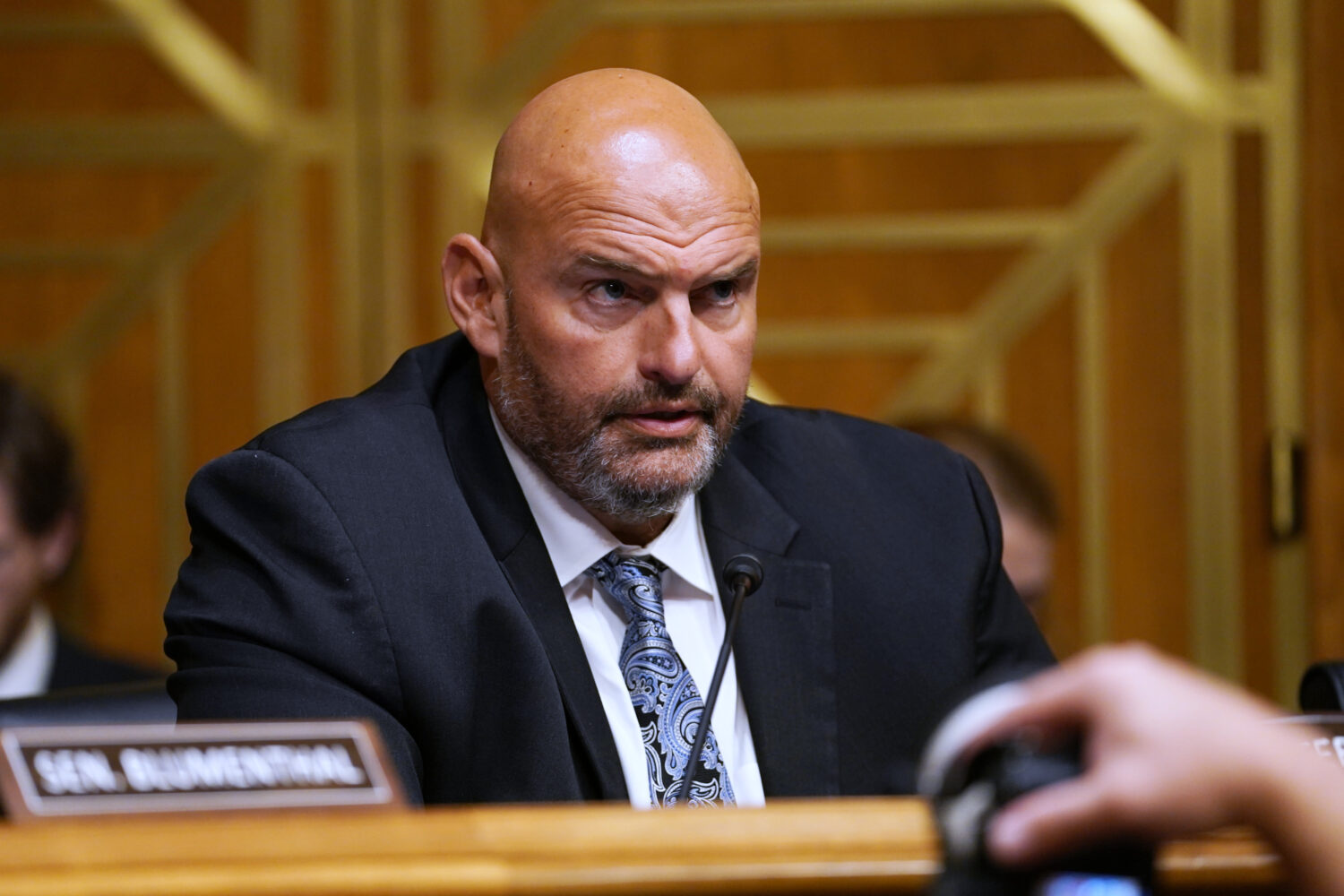 FILE - Sen. John Fetterman, D-Pa., speaks as Dr. Anthony Fauci appears before the Senate Homeland S...