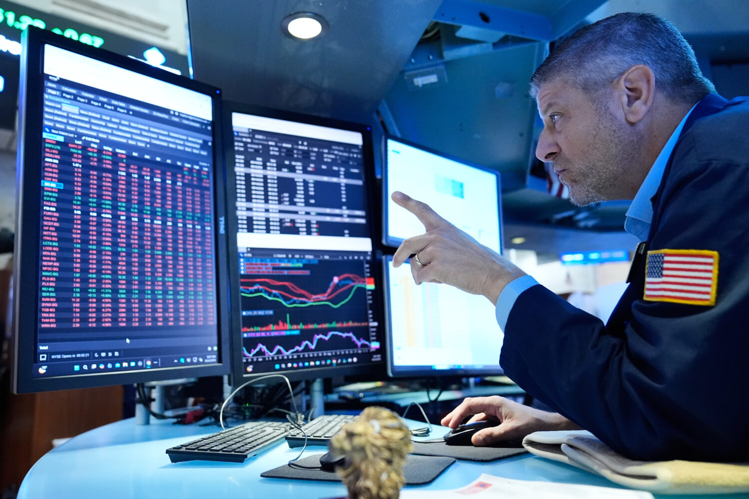 Michael Gallucchi Traders works on the floor at the New York Stock Exchange in New York, Monday, Se...