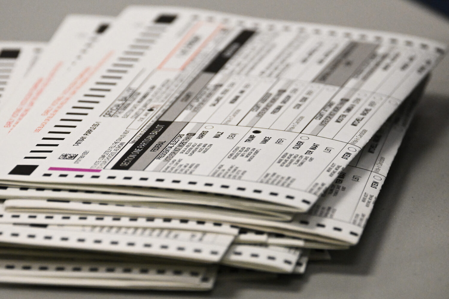 TOPSHOT - A ballot marked for Trump sits in a stack of voted ballots inside the Maricopa County Tab...