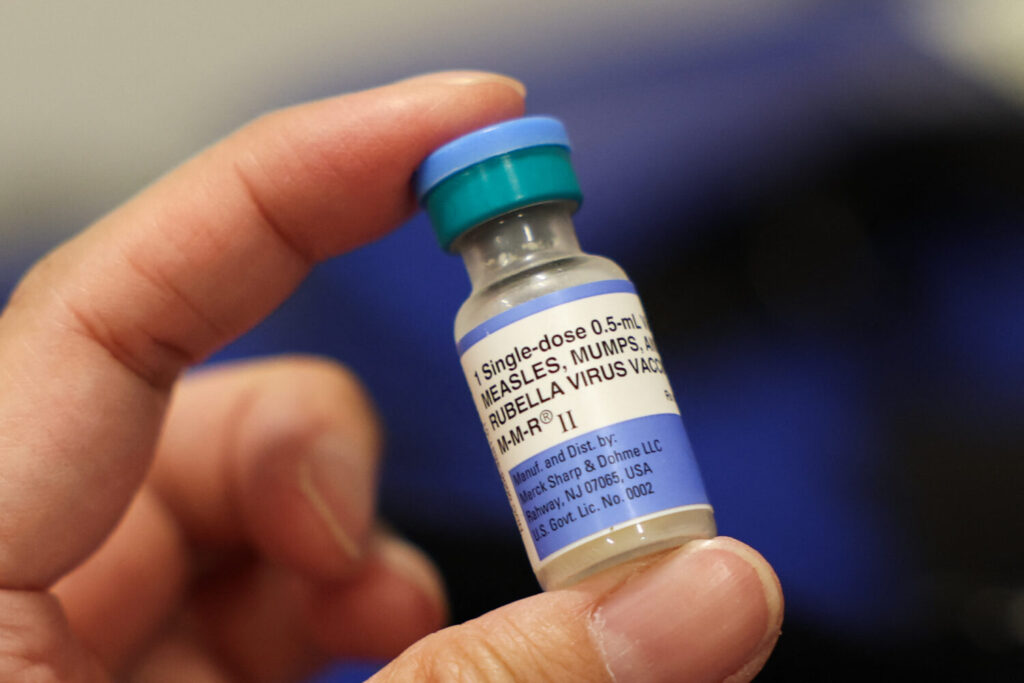 A vial of the measles, mumps and rubella vaccine is displayed during an immunization event in the Panorama City neighborhood of Los Angeles on Oct. 24, 2025. (Patrick T. Fallon/AFP via Getty Images)