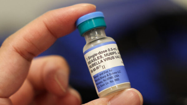 A vial of the measles, mumps and rubella vaccine is displayed during an immunization event in the Panorama City neighborhood of Los Angeles on Oct. 24, 2025. (Patrick T. Fallon/AFP via Getty Images)