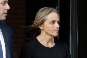 Judge accused of enabling immigrant to escape ICE gets a rare public reprimand