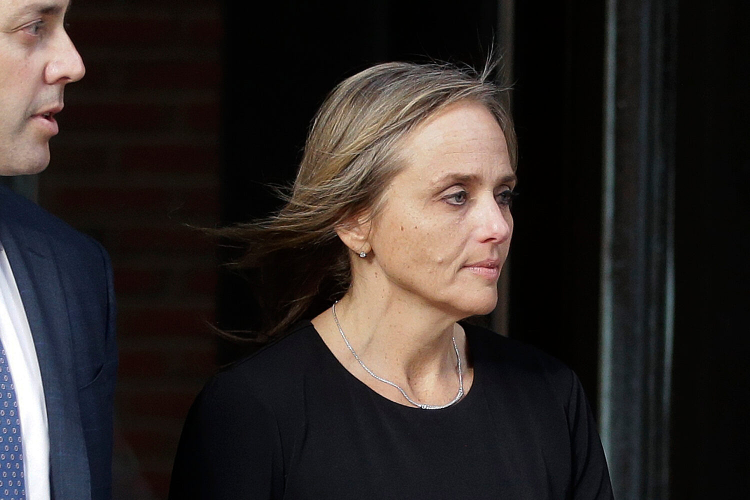 FILE - District Court Judge Shelley Joseph departs federal court, April 25, 2019, in Boston. (AP Ph...