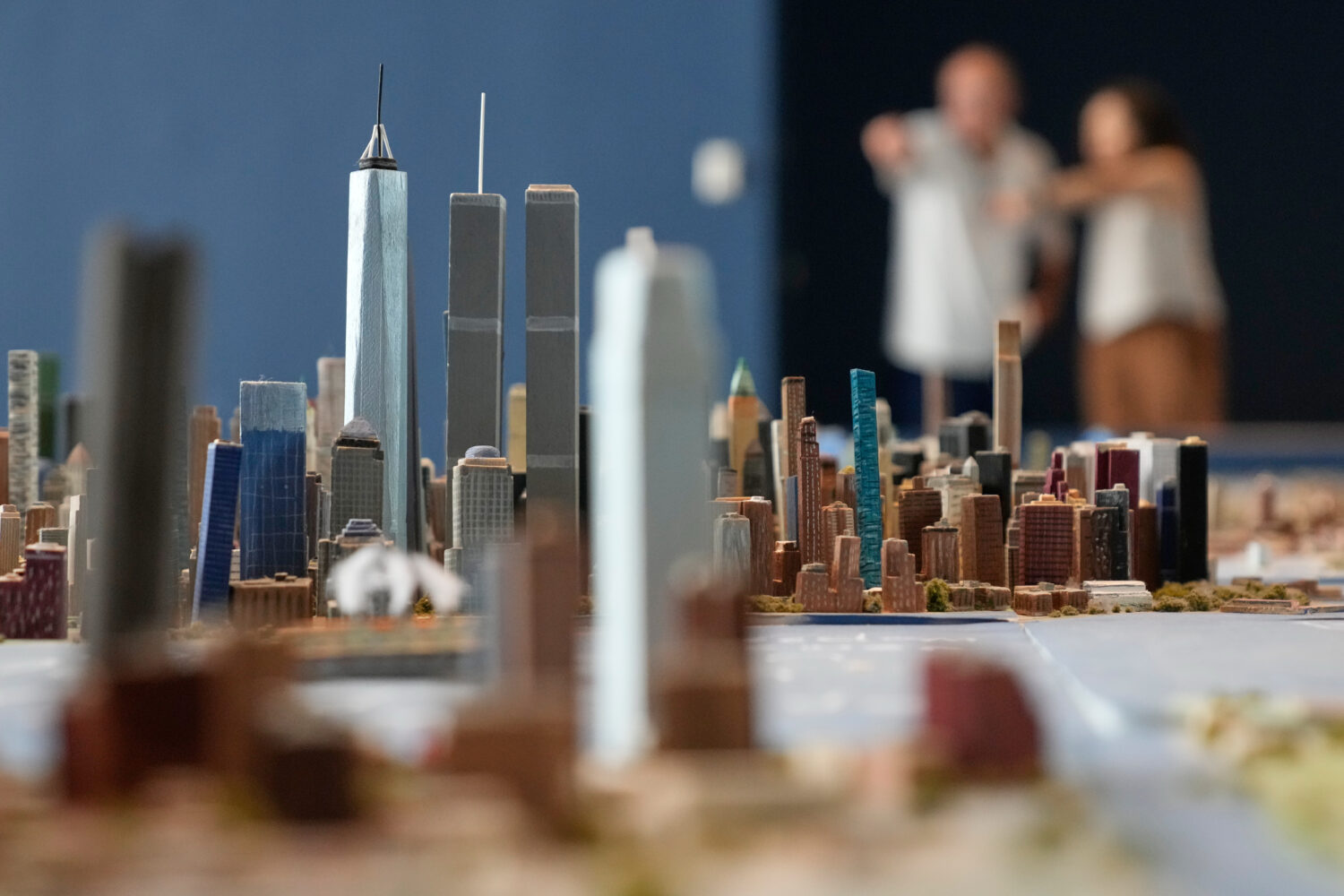 Lower Manhattan, featuring both the One World Trade and the Twin Towers, is seen on a large model o...