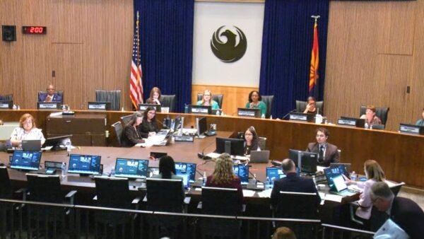The city of Phoenix approved a settlement Wednesday with a Wall Street Journal reporter who filed an excessive force complaint against a police officer in November 2022.
