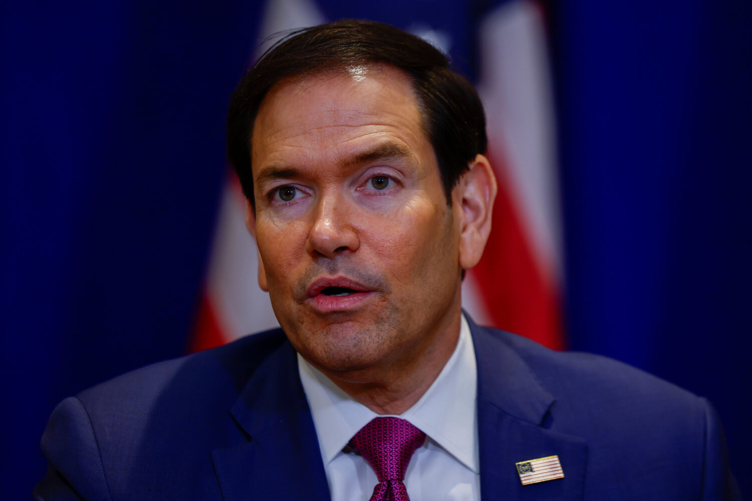 U.S. Secretary of State Marco Rubio speaks to members of the media during a signing ceremony on the...