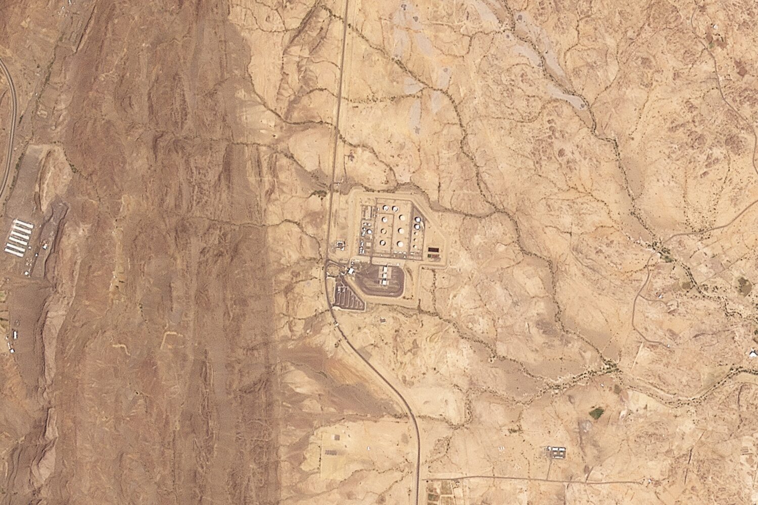 This satellite image provided by Planet Labs PBC shows a Saudi Aramco oil refinery north of Abha, S...