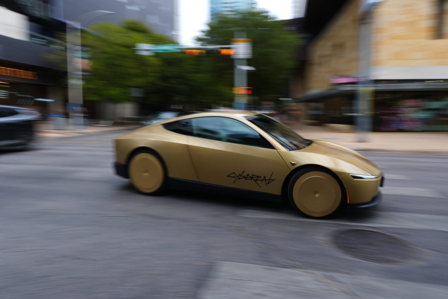 A Tesla Cybercab moves through downtown Austin, Texas, Thursday, Sept. 3, 2026. (AP Photo/Eric Gay)...