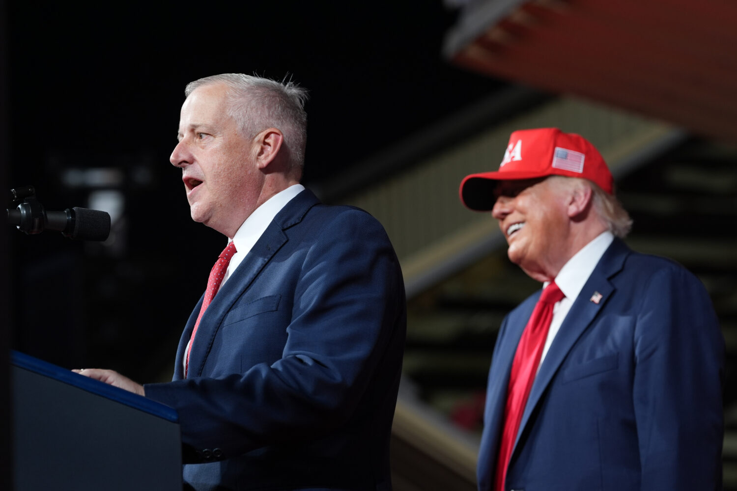 President Donald Trump listens as North Carolina Republican U.S. Senate candidate Michael Whatley s...