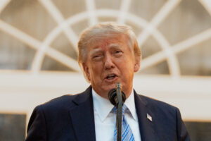 The Latest: Postal chief says work has stopped on system key to Trump effort to limit mail voting