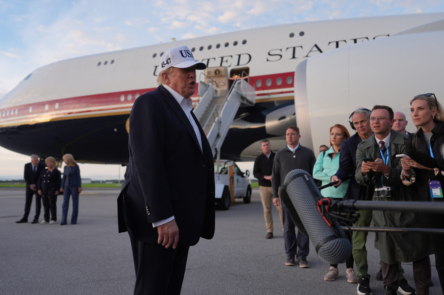 U.S. President Donald Trump speaks with journalists prior to boarding Air Force One at Shannon Airp...