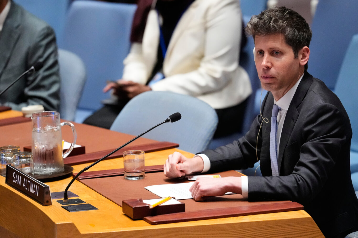 Sam Altman, CEO of OpenAI, listens during a Security Council meeting on artificial intelligence at ...