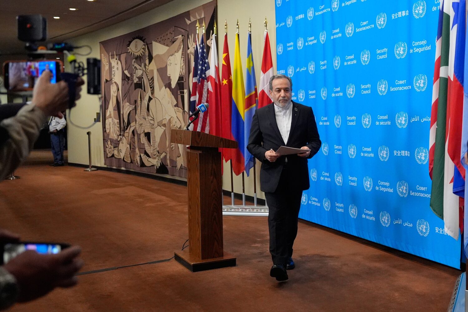 Iran's Foreign Minister Abbas Araghchi walks from the podium after speaking to the media during the...