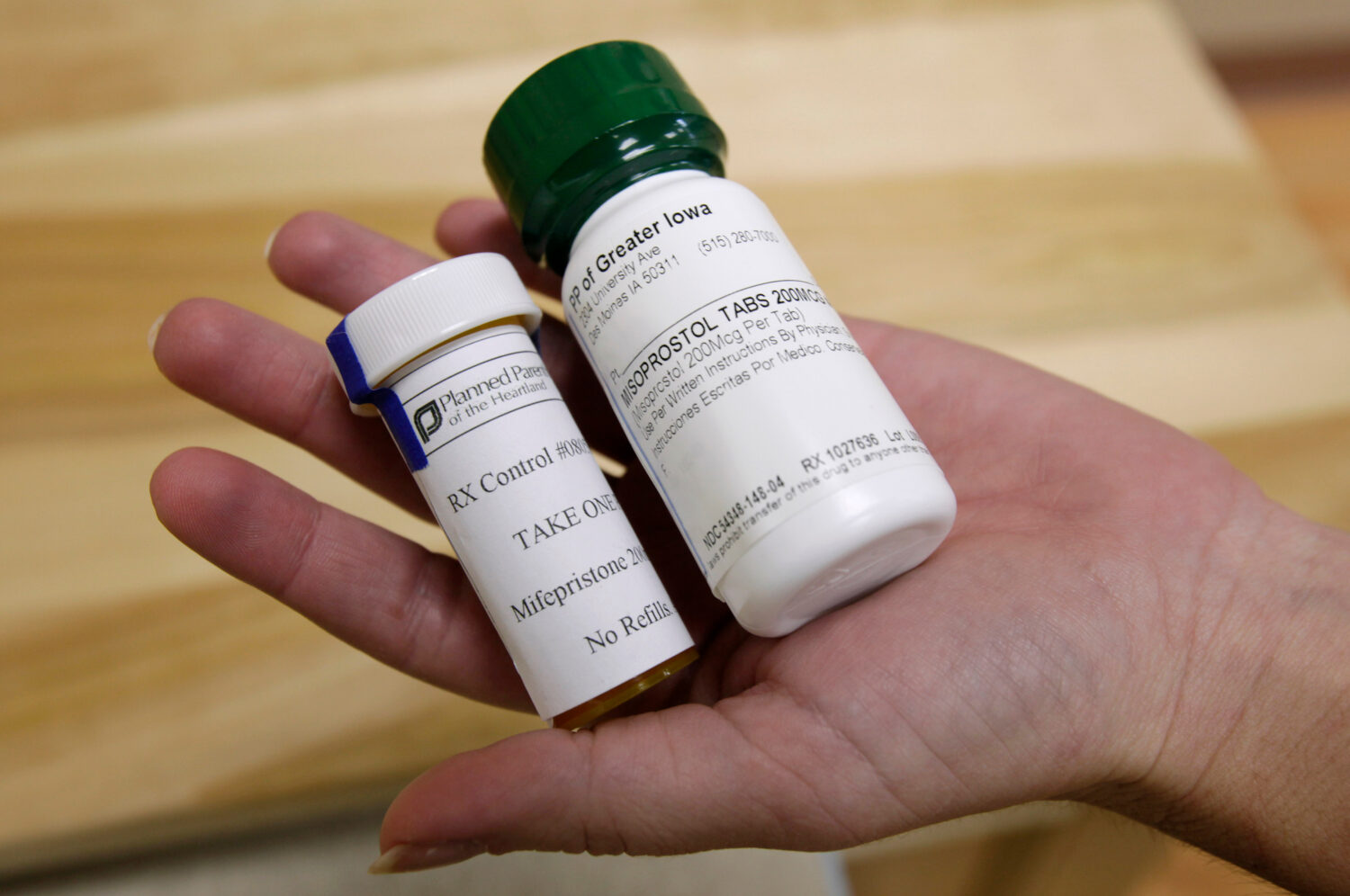 FILE - Bottles of abortion pills mifepristone, left, and misoprostol, right, are displayed at a cli...