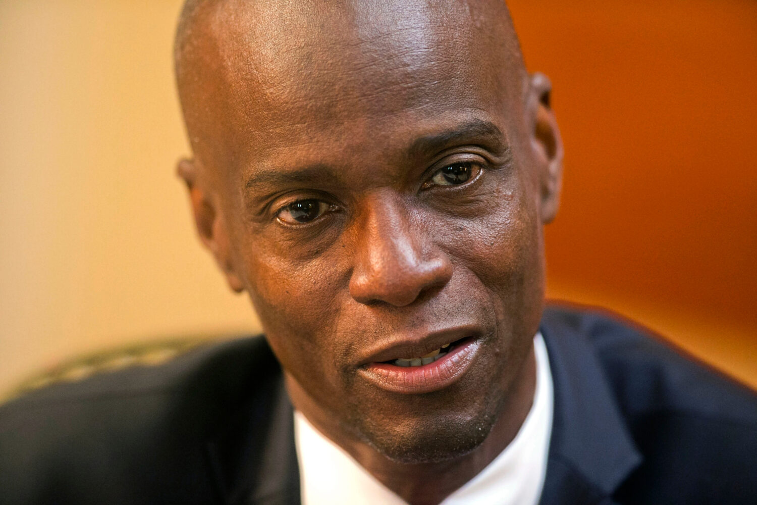 FILE - Haiti's President Jovenel Moise speaks during an interview at his home in Petion-Ville, a su...