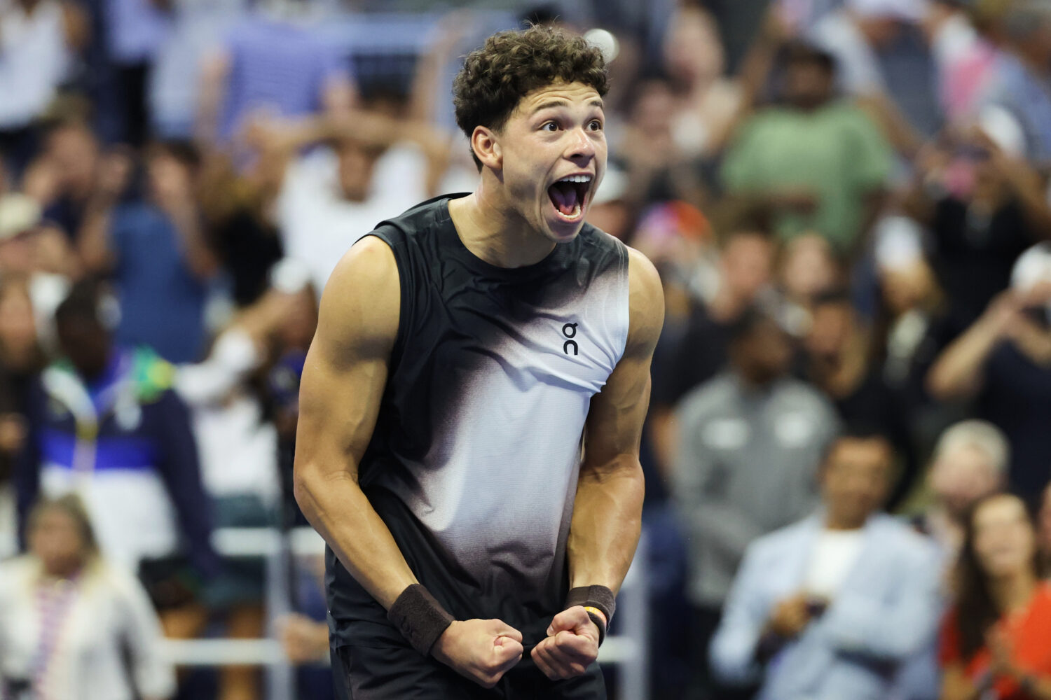 Ben Shelton, of the United States, celebrates after winning against Carlos Alcaraz, of Spain, inthe...