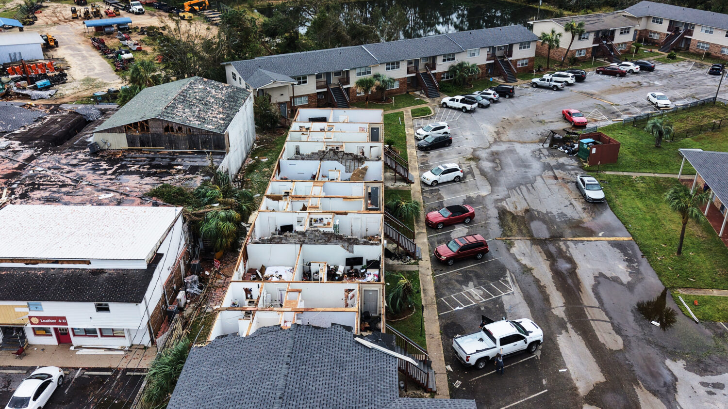 An apartment complex which had its roof ripped off is seen in the aftermath of Hurricane Isaias in ...