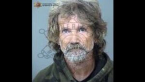 Man arrested in death of woman found injured under car in Phoenix