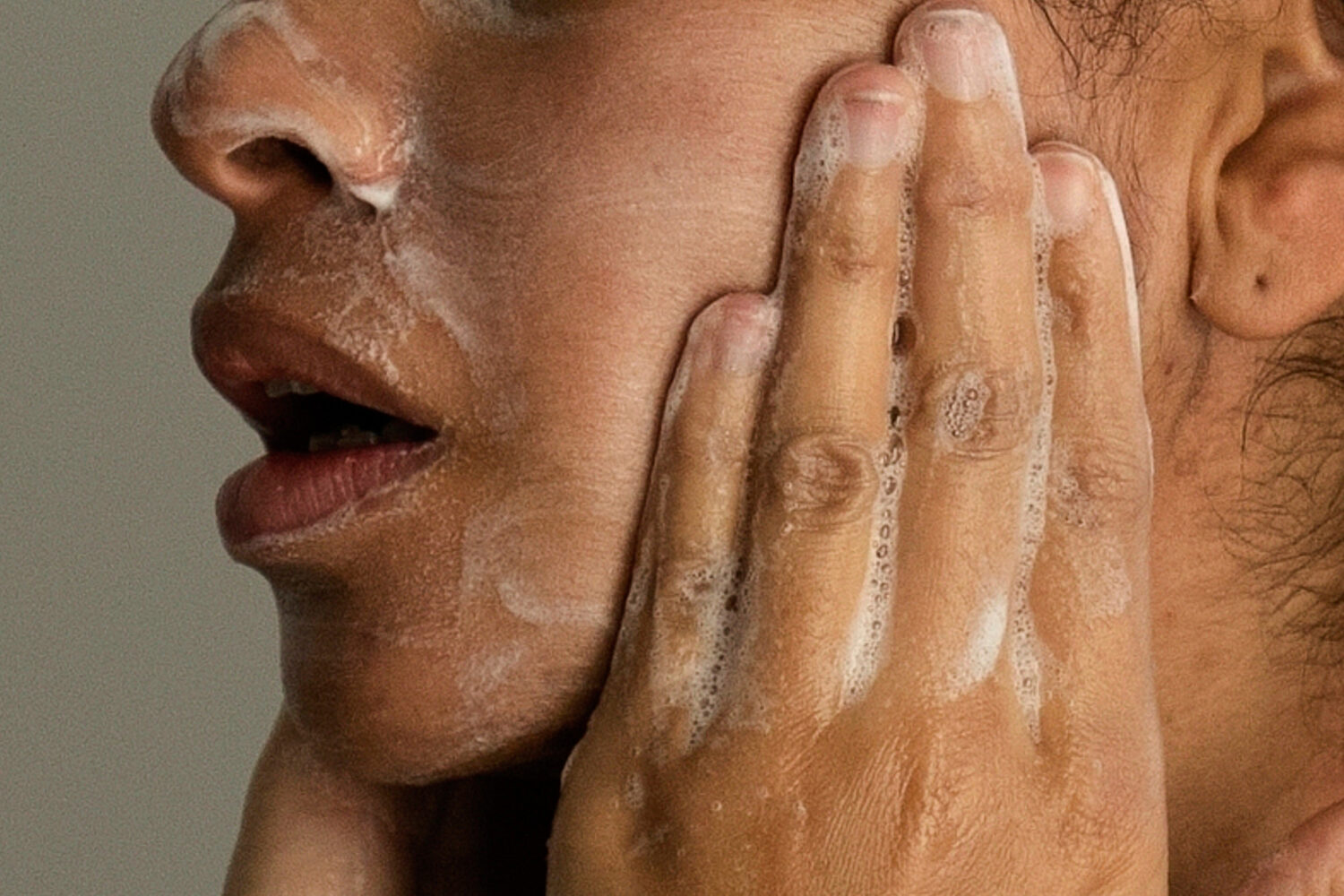 FILE - A woman washes her face as she prepares for work in Chicago, on Friday, Feb. 10, 2023. (AP P...