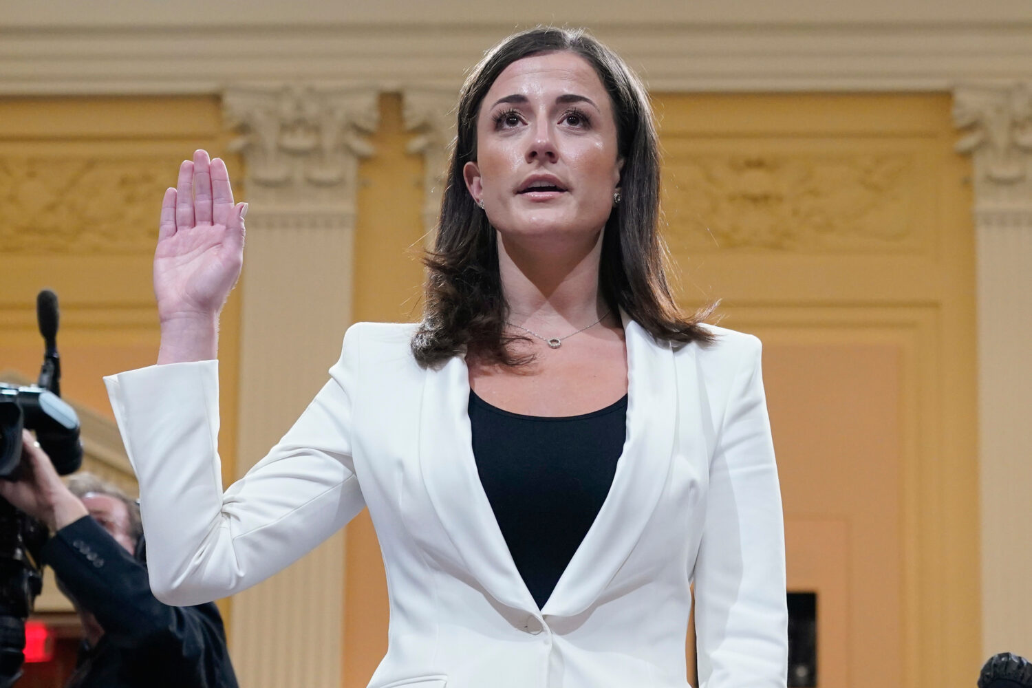 FILE - Cassidy Hutchinson, former aide to Trump White House chief of staff Mark Meadows, is sworn i...
