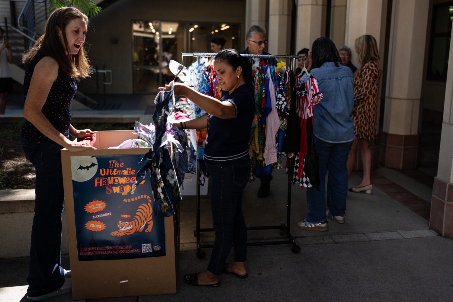 People gather at a Halloween costume swap at Occidental College in Los Angeles, Friday, Oct. 16, 20...