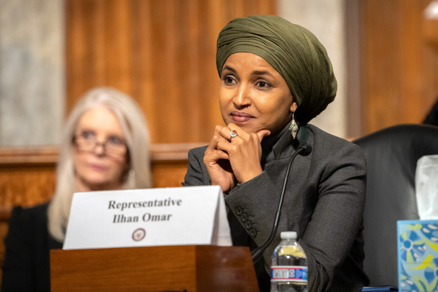 Rep. Ilhan Omar, D-Minn., listens during a Congressional spotlight hearing on Capitol Hill, Tuesday...