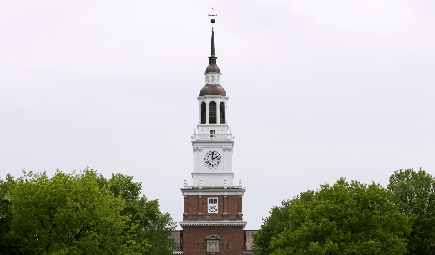 FILE - The spire of the Baker-Berry Library stands above The Green at Dartmouth College in Hanover,...