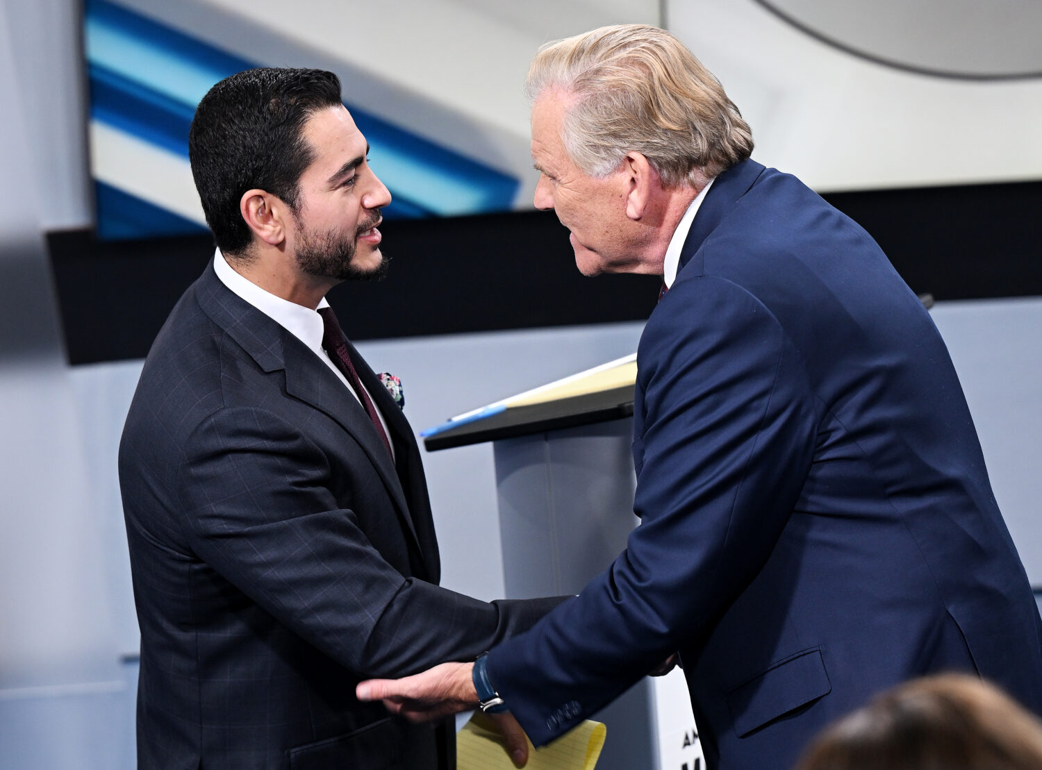 U.S. Senate candidates Democrat Abdul El-Sayed, left, and Republican Mike Rogers shake hands after ...