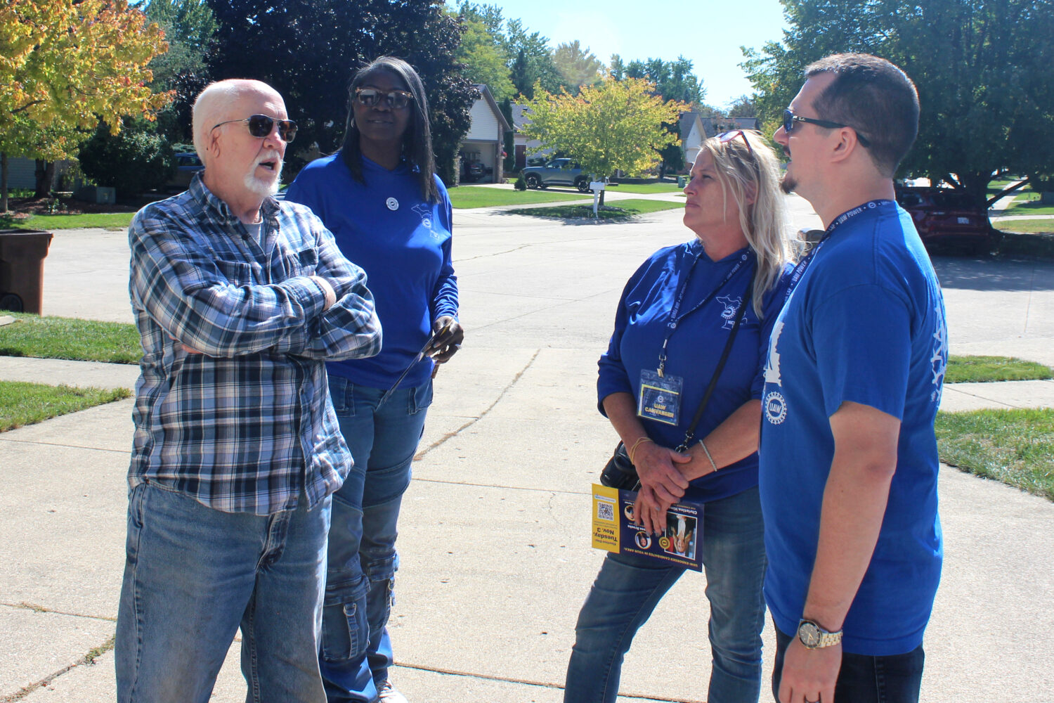 Walter Usakowski, from left, a retired worker from the Ford Motor Co.'s Sterling Axe Plant who plan...