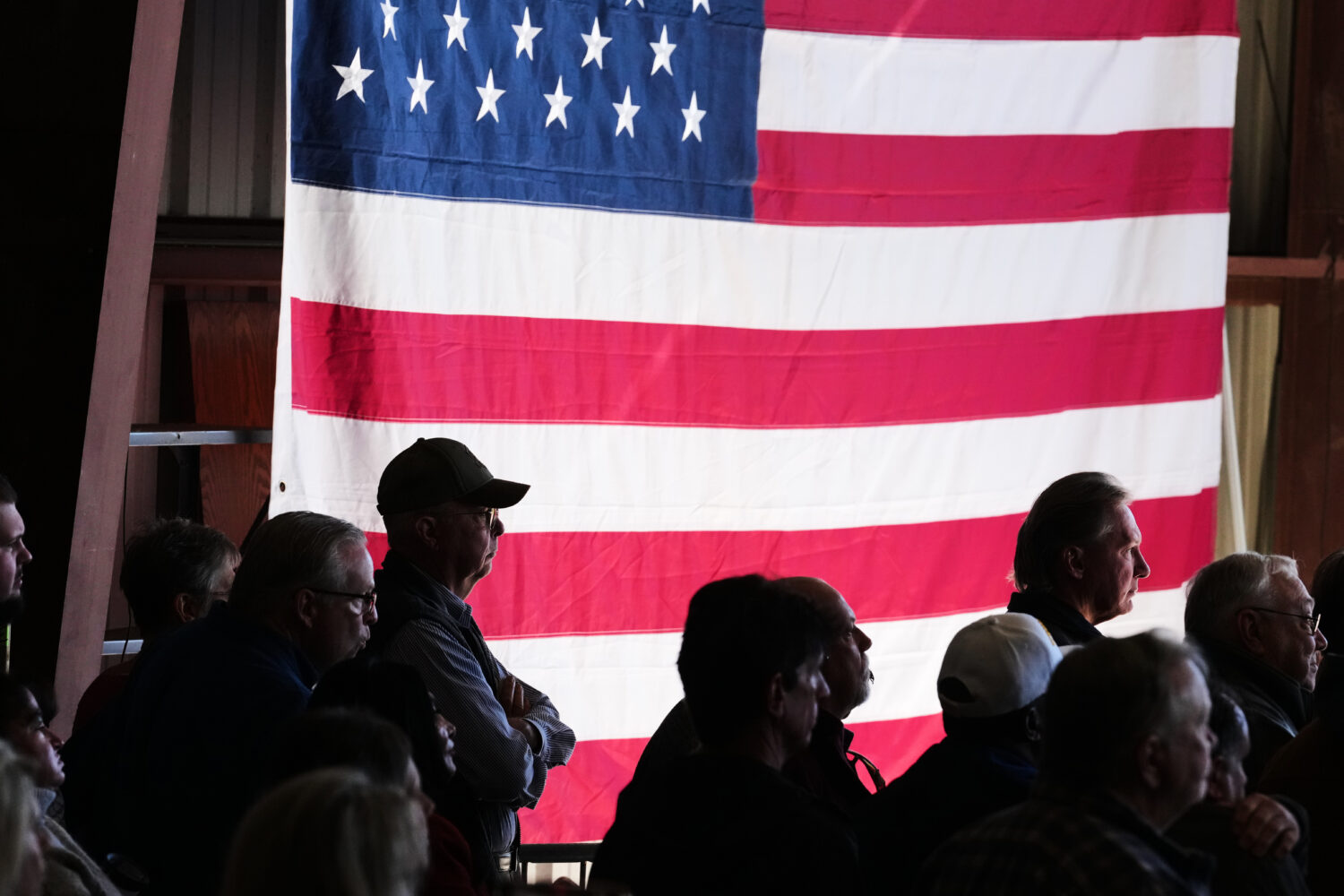 Attendees listen as Republican U.S. Senate candidate Texas Attorney General Ken Paxton speaks at a ...