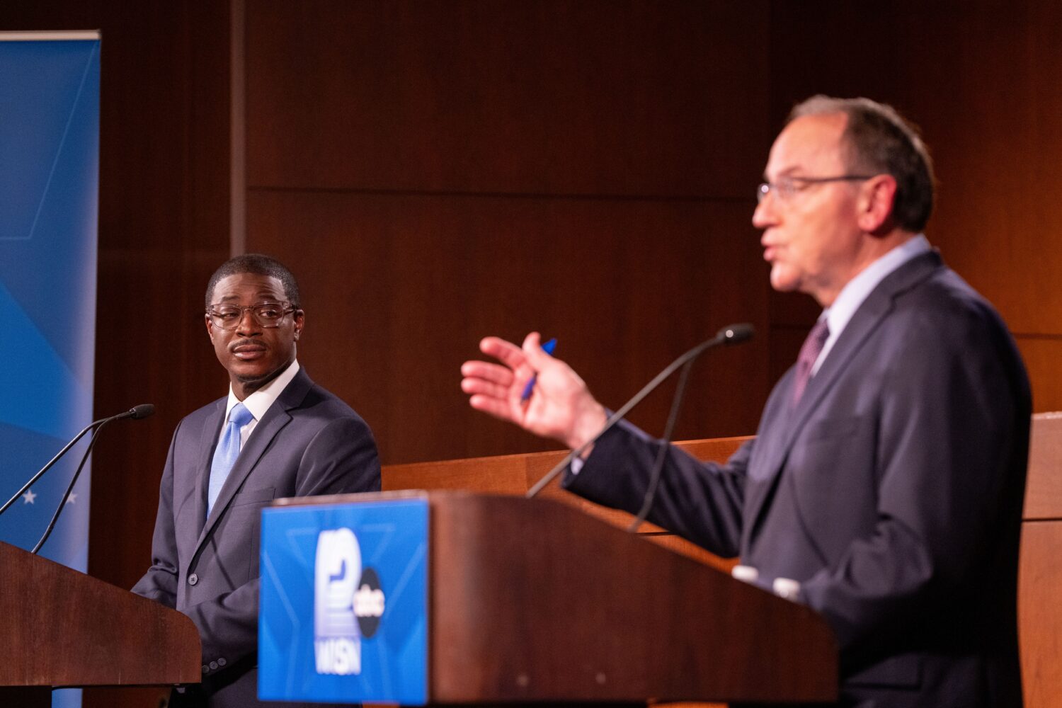 Wisconsin Democratic gubernatorial nominee David Crowley, left, listens as Wisconsin Republican gub...