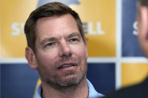 AP sources: Federal agents search Beverly Hills mansion in investigation of ex-Rep. Eric Swalwell