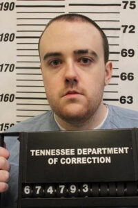 Man serving a life sentence for murder slips through a fence and escapes a Tennessee prison