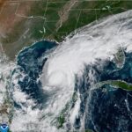 El Niño’s storm-killer winds and climate’s warming waters in fight over future of Hurricane Isaias
