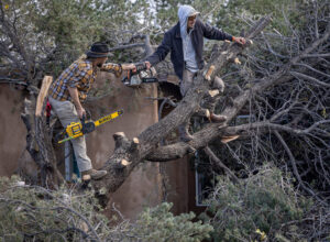 Flood warning lingers in Four Corners as soaked towns face sewage-tainted waters. 1 death reported