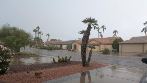 Light rain pops up in portions of the Valley as temperatures begin to drop.