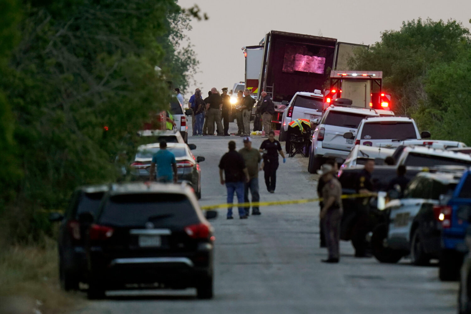FILE - Police and other first responders work the scene where officials say dozens of people have b...