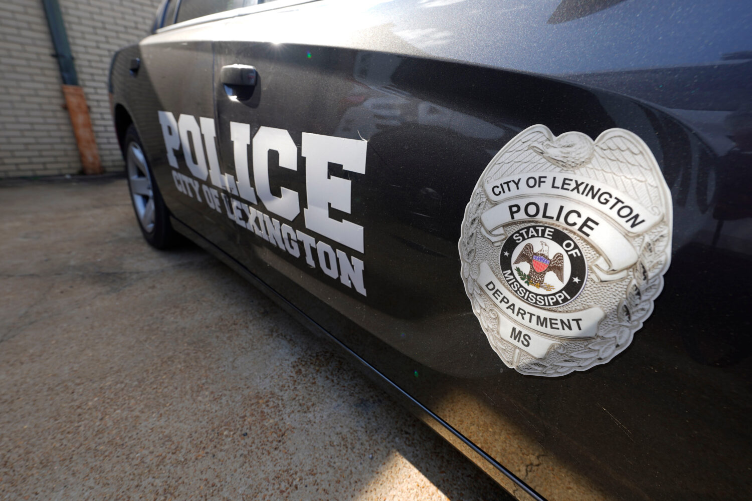 FILE - A Lexington, Miss., police cruiser is parked outside their facility near the town square, Mo...